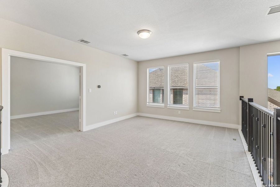 Spacious, unfurnished interior of a new home in 6 Creeks, Kyle (Image 15).