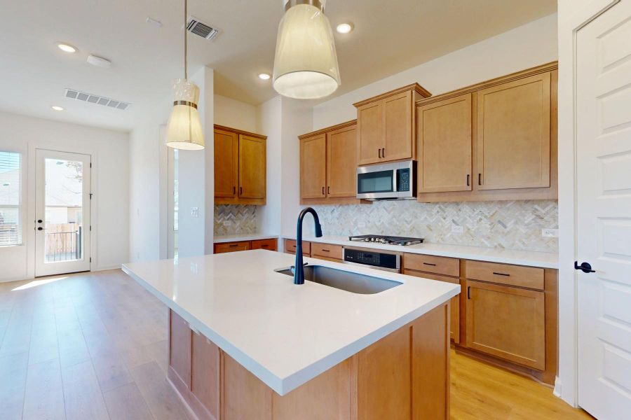 Furnished interior view inside a new home in Heritage, Dripping Springs (Image 8).