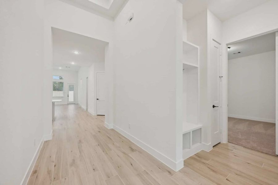 Representative unfurnished interior of a home built from the Lauren by Chesmar Homes in University Heights, McKinney (Image 12). Representative unfurnished interior of a home built from the Lauren by Chesmar Homes in University Heights, McKinney (Image 12).