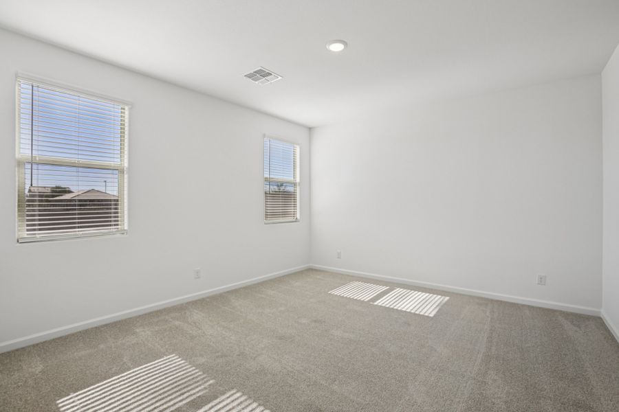 Primary suite. Finishes and options may vary by community.