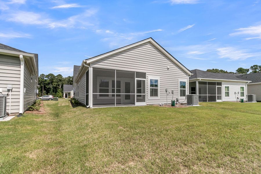 Front exterior of a new home in Horizons at Summers Corner | 55+: The Cottages, Summerville, SC, highlighting curb appeal (Image 29). Front exterior of a new home in Horizons at Summers Corner | 55+: The Cottages, Summerville, SC, highlighting curb appeal (Image 29).