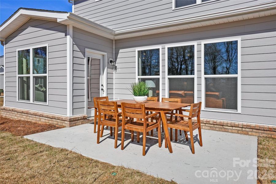 Exterior details and patio area of a home in Riverstone, Monroe (Image 3).