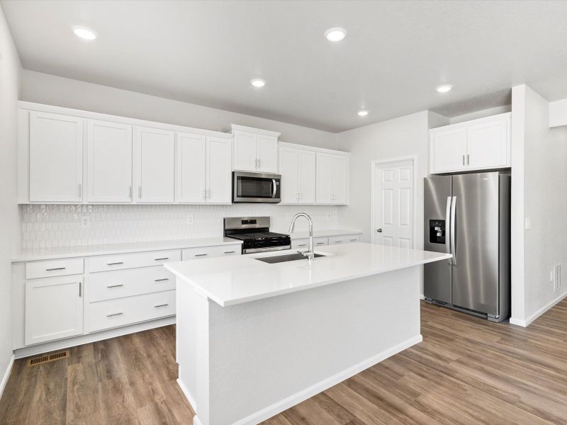Furnished interior view inside a new home in Paint Brush Hills, Peyton (Image 3).