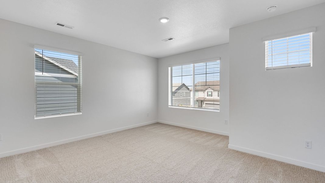 Spacious, unfurnished interior of a new home in Trails at Crowfoot, Parker (Image 17).