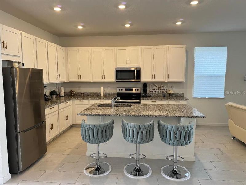 Furnished interior view inside a new home in Cypress Park Estates, Haines City (Image 6).