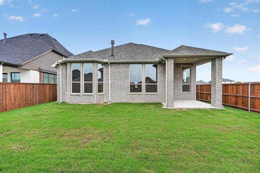 Exterior details and patio area of a home in Wellington, Haslet (Image 3). Exterior details and patio area of a home in Wellington, Haslet (Image 3).