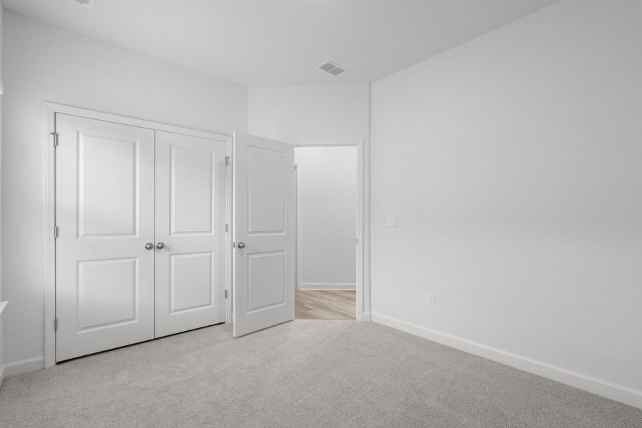 Spacious, unfurnished interior of a new home in Cypress Ridge - The Boardwalk Series, Longs (Image 16).