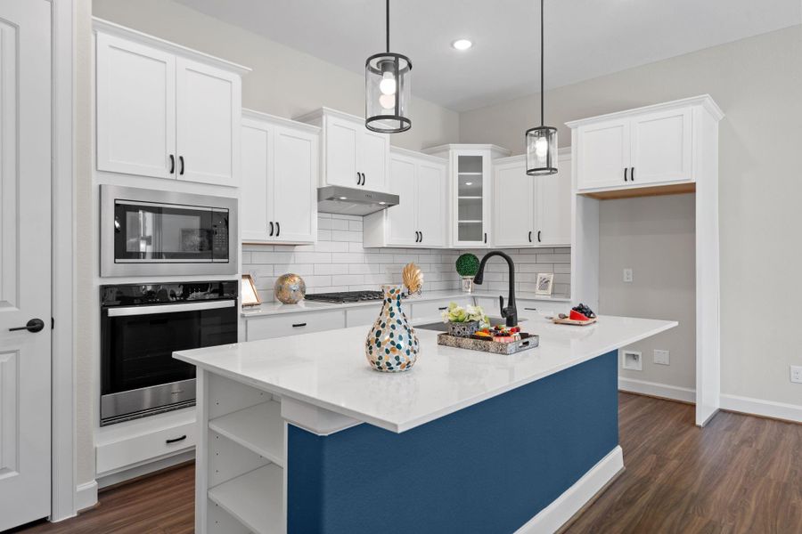 Flooded with natural light, the Palazzo kitchen serves as the true heart of the home—an inviting space where cooking, conversation, and connection naturally come together. Image depicts home as-is. Flooded with natural light, the Palazzo kitchen serves as the true heart of the home—an inviting space where cooking, conversation, and connection naturally come together. Image depicts home as-is.