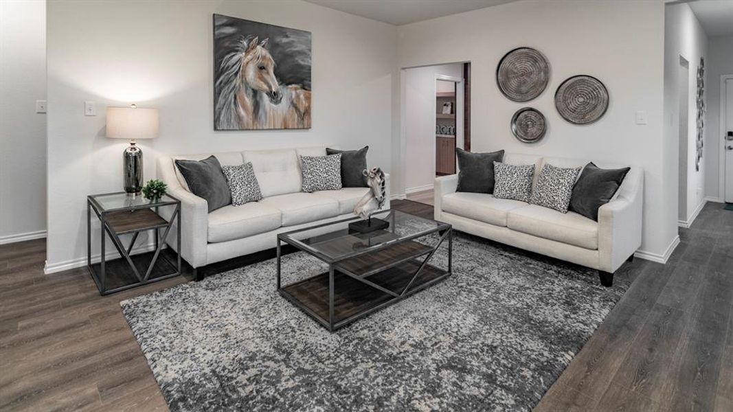 Living area featuring dark wood-type flooring