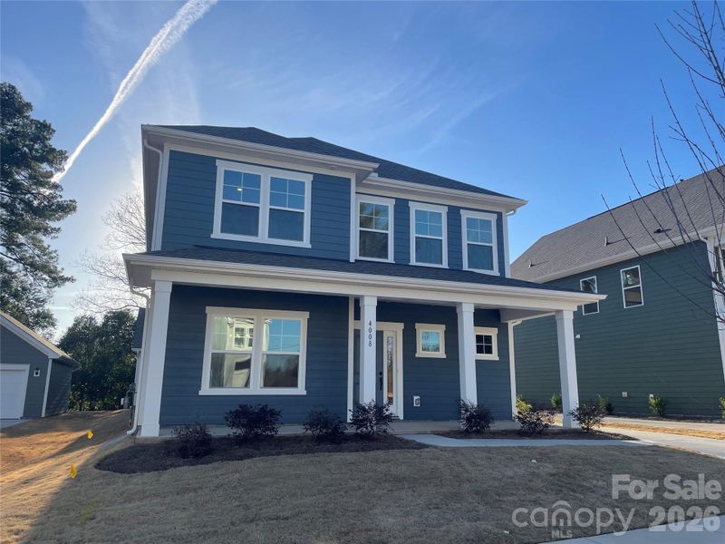 Front exterior of a new home in Arbor Village, Matthews, NC, highlighting curb appeal (Image 25).