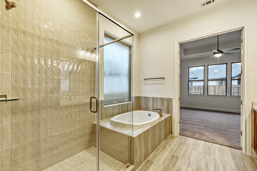 Furnished interior view inside a new home in 6 Creeks, Kyle (Image 6).