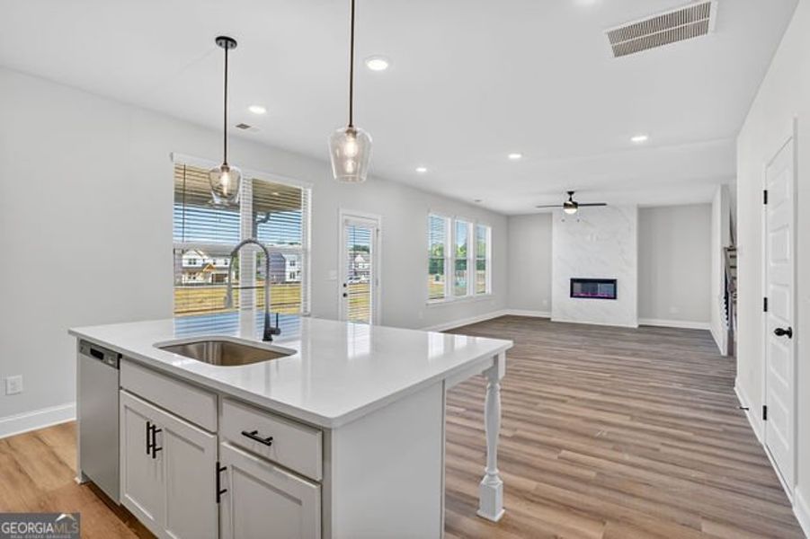Furnished interior view inside a new home in Stone Brooke, Gray (Image 9).