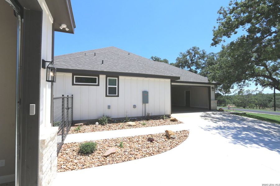 Exterior details and patio area of a home in , La Vernia (Image 50).