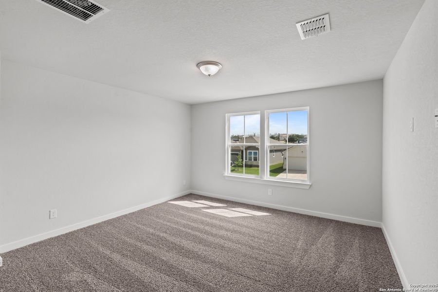 Spacious, unfurnished interior of a new home in The Meadows at Hunters Ranch, San Antonio (Image 22).