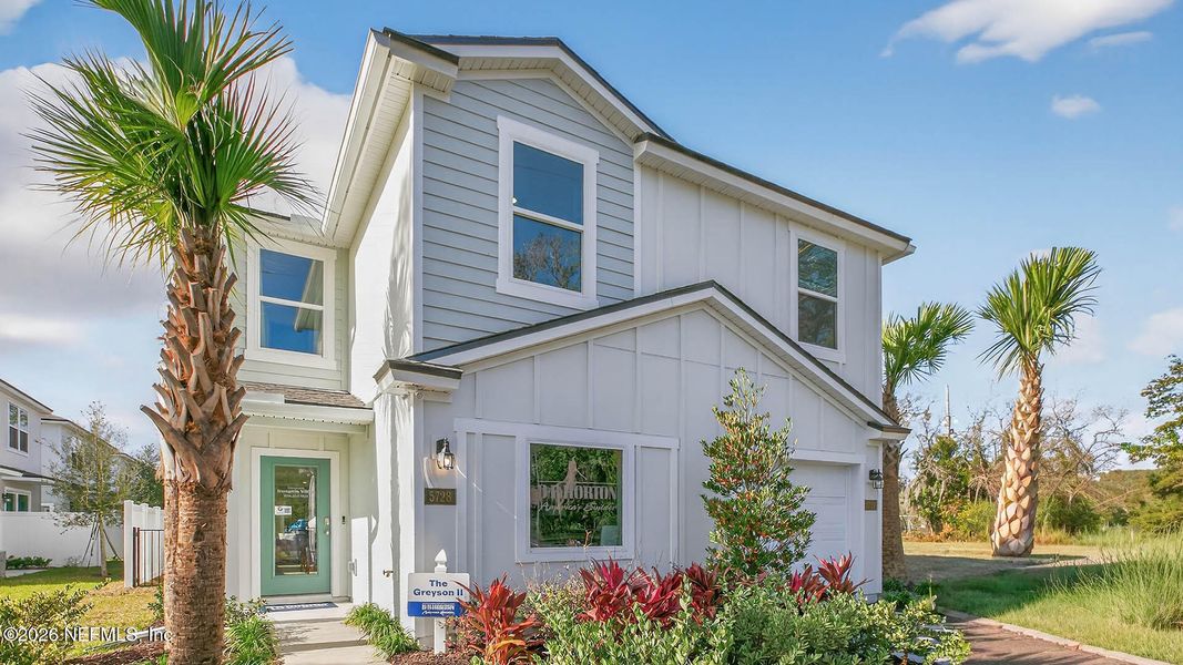 Front exterior of a new home in Irongate Villas, Jacksonville, FL, highlighting curb appeal (Image 21).