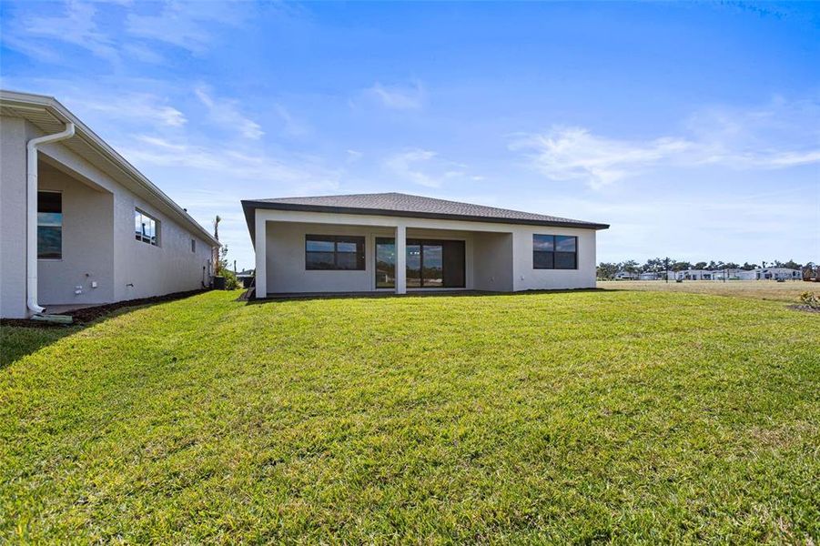 Exterior details and patio area of a home in Woodland Preserve, Parrish (Image 3). Exterior details and patio area of a home in Woodland Preserve, Parrish (Image 3).