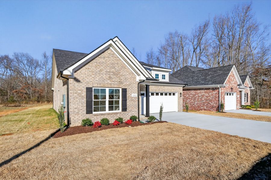 Front exterior of a new home in Legacy Preserve, Tullahoma, TN, highlighting curb appeal (Image 21).