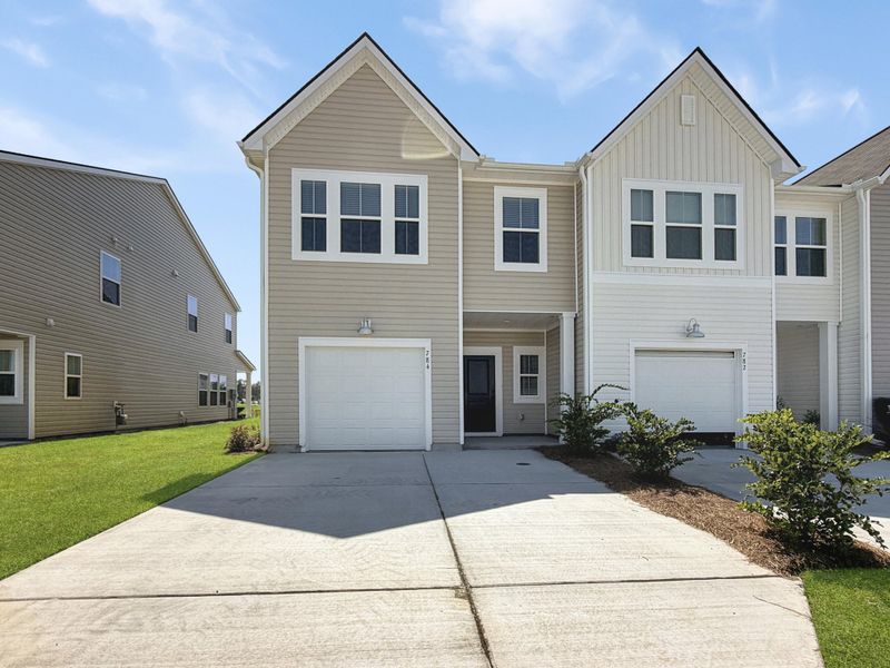 Front exterior of a new home in , Summerville, SC, highlighting curb appeal (Image 22).