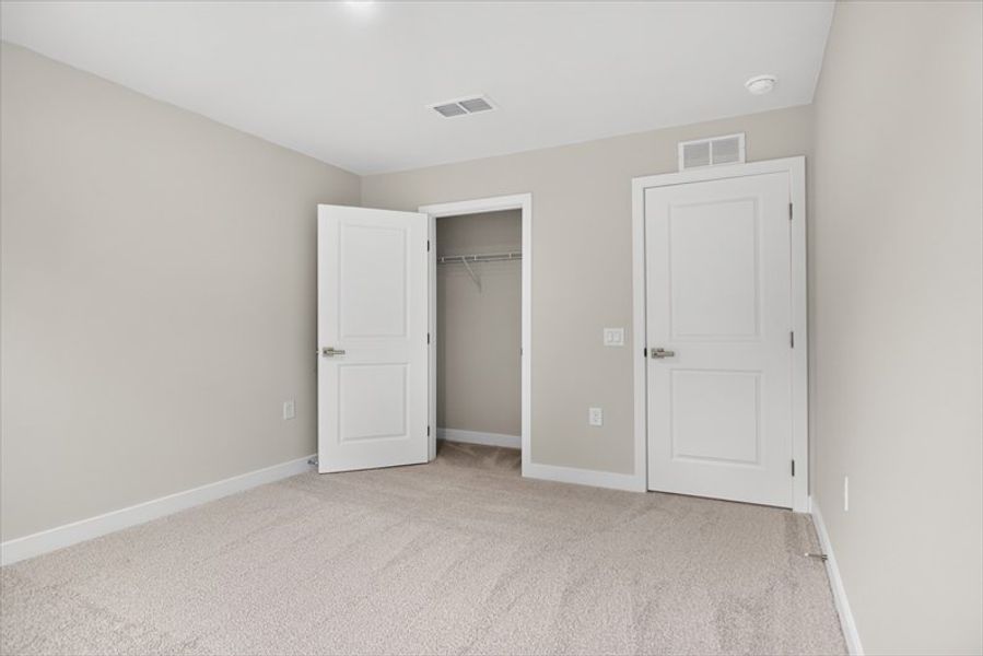 Spacious, unfurnished interior of a new home in Arden Woods, Greenville (Image 17).