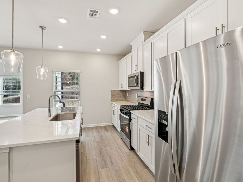 Furnished interior view inside a new home in Harmony Manor, Fairburn (Image 8).
