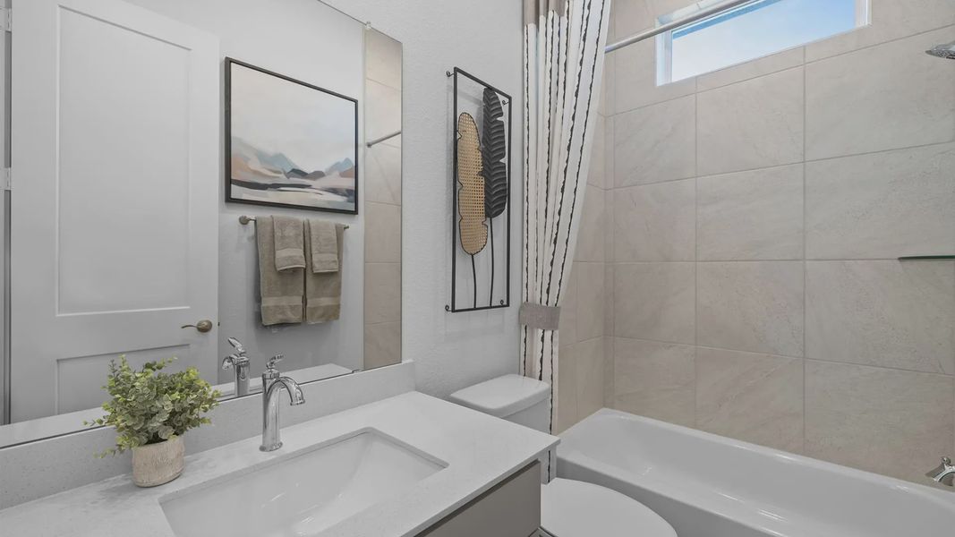Representative furnished interior of a home built from the Bonneville by Chesmar Homes in Attwater 55s, Waller (Image 19).