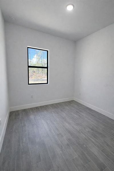 Spacious, unfurnished interior of a new home in , Port Charlotte (Image 10).
