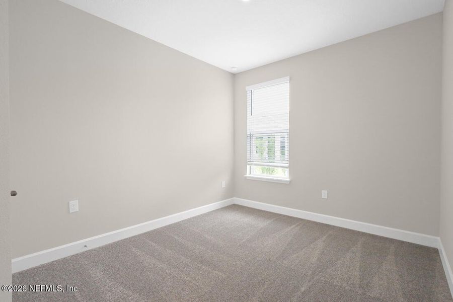 Spacious, unfurnished interior of a new home in Colbert Landings, Palm Coast (Image 8).