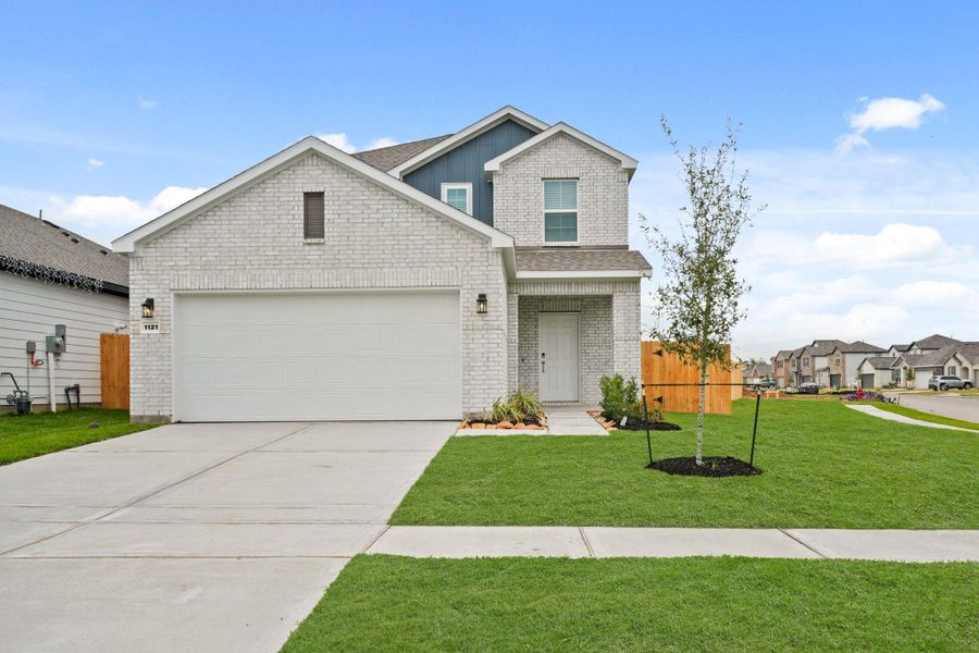 Front exterior of a new home in Valor Park, Bay City, TX, highlighting curb appeal (Image 2). Front exterior of a new home in Valor Park, Bay City, TX, highlighting curb appeal (Image 2).