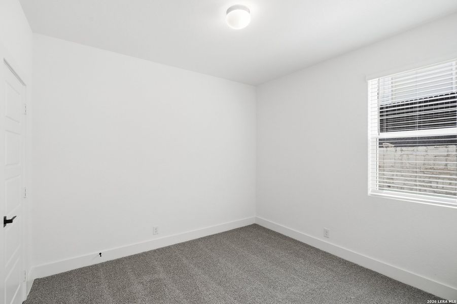 Spacious, unfurnished interior of a new home in Centero at Stone Oak, San Antonio (Image 21).