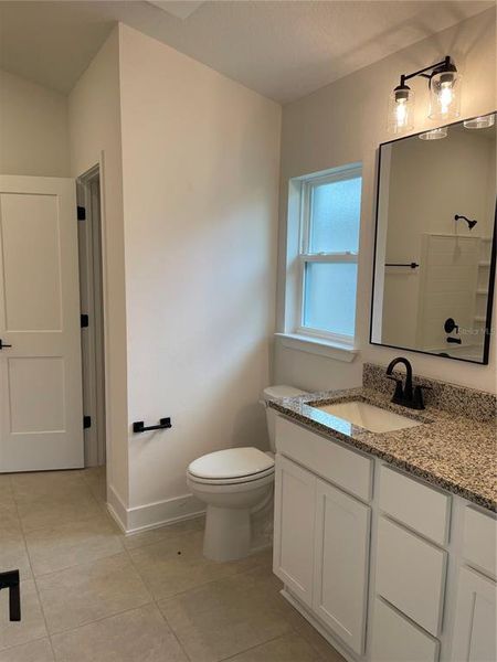 Furnished interior view inside a new home in Harmony Central, St. Cloud (Image 4).