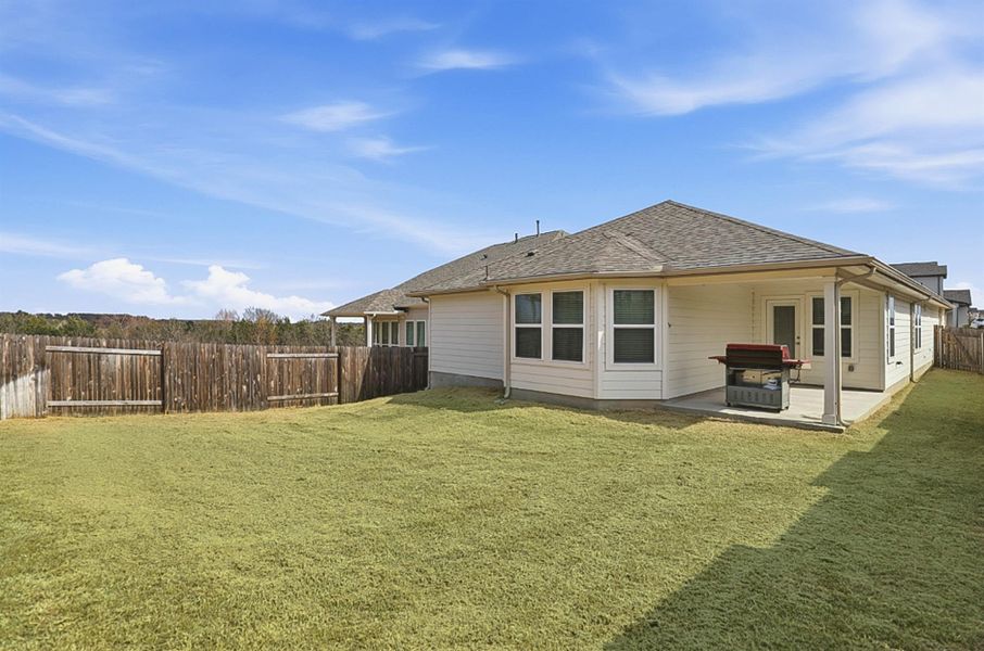 This home offers the best of both worlds - Enjoy the charm of small-town living while remaining just 20 minutes from downtown Austin.