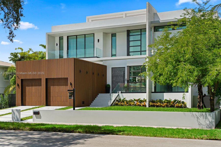 Front exterior of a new home in , Miami Shores, FL, highlighting curb appeal (Image 25).