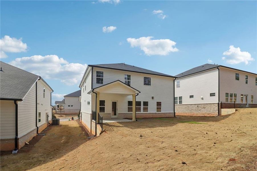 Exterior details and patio area of a home in Harmony Manor, Fairburn (Image 35).