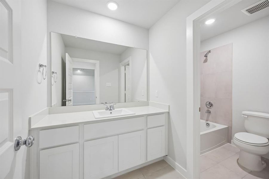 Bathroom in the Mesquite home plan by Trophy Signature Homes – REPRESENTATIVE PHOTO Bathroom in the Mesquite home plan by Trophy Signature Homes – REPRESENTATIVE PHOTO