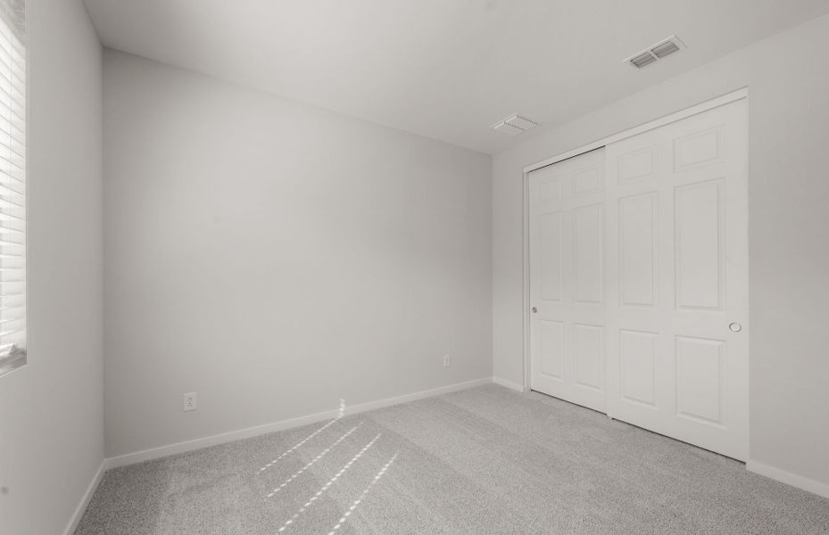 Spacious, unfurnished interior of a new home in Blossom Rock, Apache Junction (Image 22).