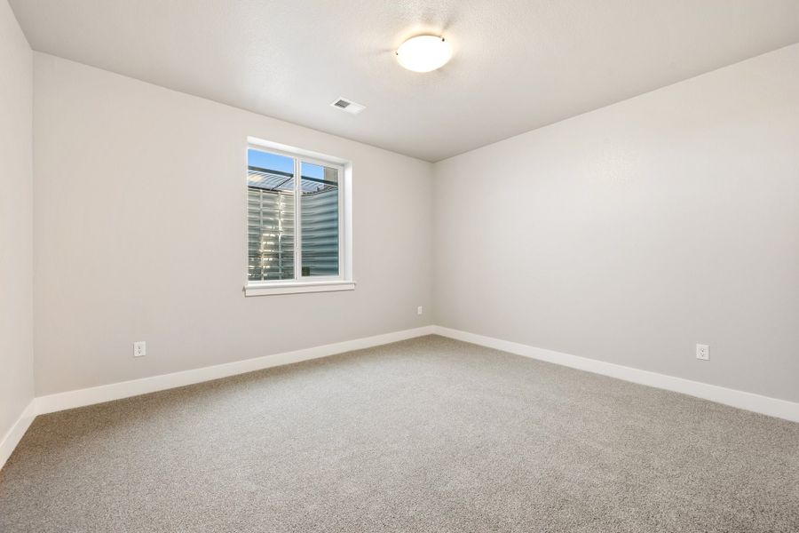 Spacious, unfurnished interior of a new home in The Lakes at Centerra, Loveland (Image 22).