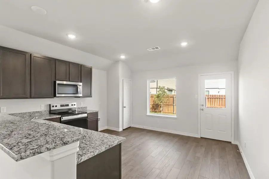 Furnished interior view inside a new home in Hanna Ranch, Everman (Image 7).