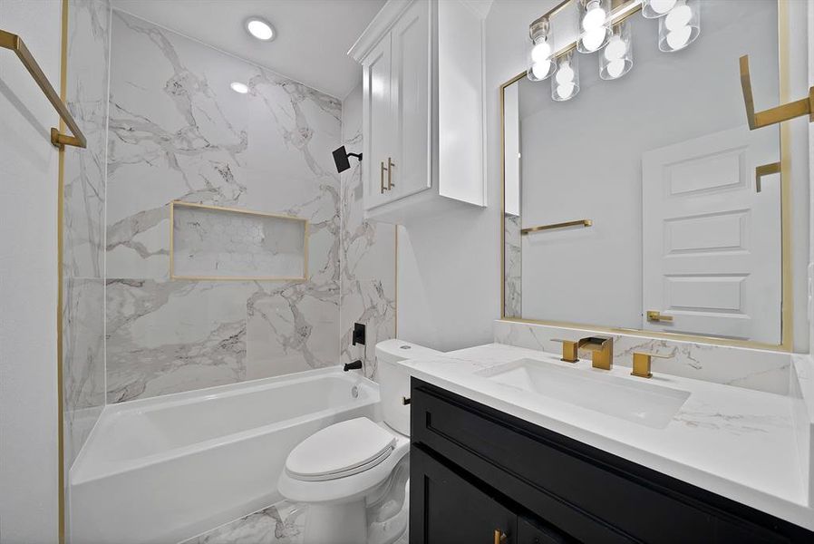 Full bath with bathing tub / shower combination and vanity