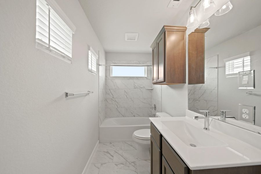 Furnished interior view inside a new home in Beacon Hill, Waller (Image 3). Furnished interior view inside a new home in Beacon Hill, Waller (Image 3).