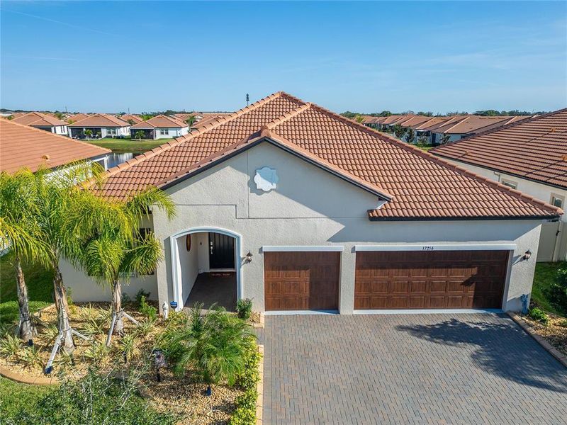 Front exterior of a new home in , Wimauma, FL, highlighting curb appeal (Image 2). Front exterior of a new home in , Wimauma, FL, highlighting curb appeal (Image 2).