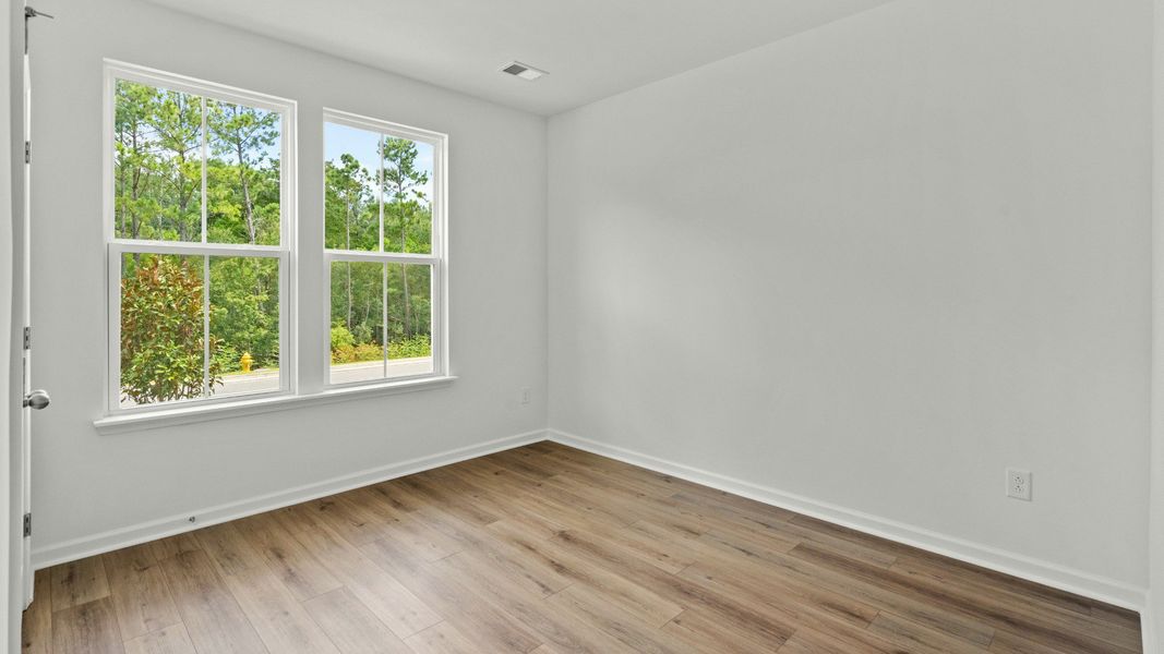 Furnished interior view inside a new home in Bluffs at Sun Colony, Longs (Image 22).