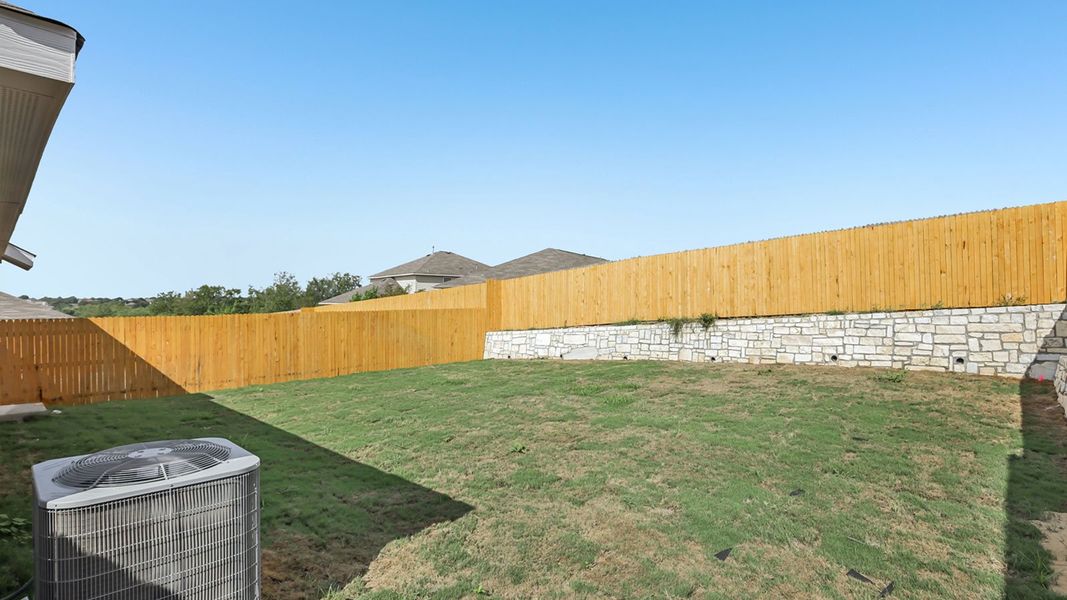 Exterior details and patio area of a home in Talavera, Kyle (Image 3).