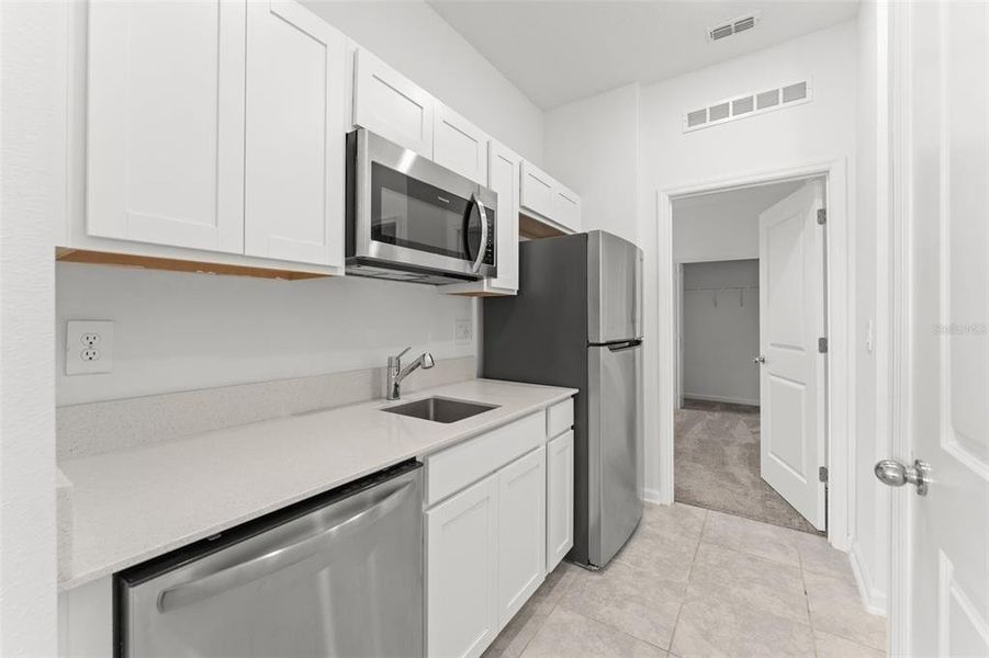 Furnished interior view inside a new home in Peace Creek Reserve, Winter Haven (Image 14).