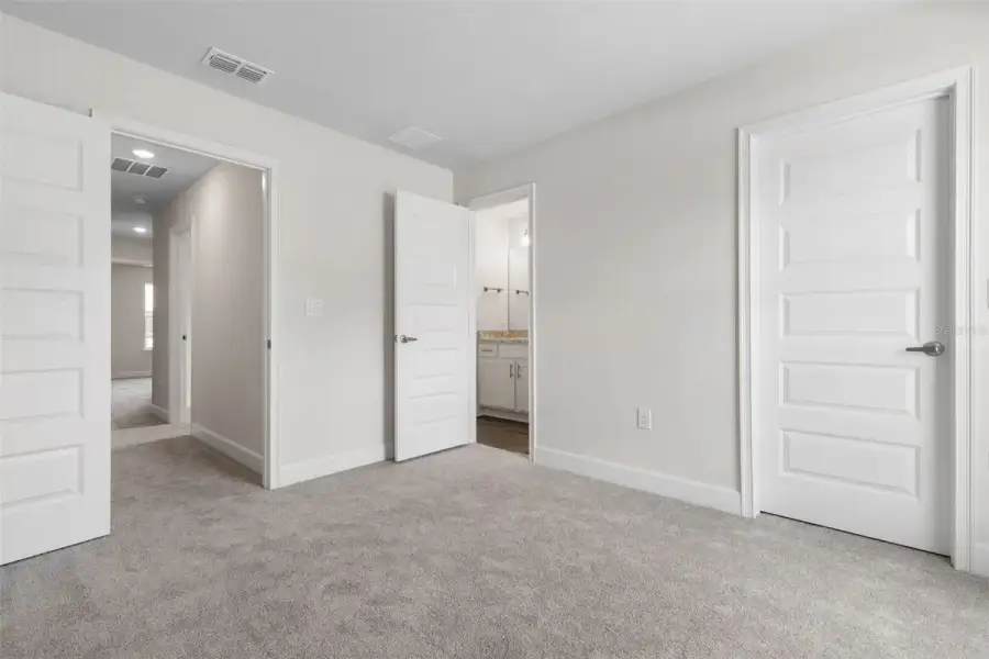Representative unfurnished interior of a home built from the 2117 by Adams Homes in Flagler Estates, Hastings (Image 34).