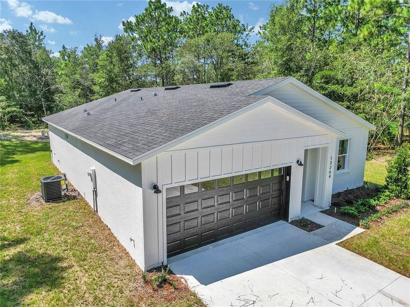 Front exterior of a new home in , Ocala, FL, highlighting curb appeal (Image 29).