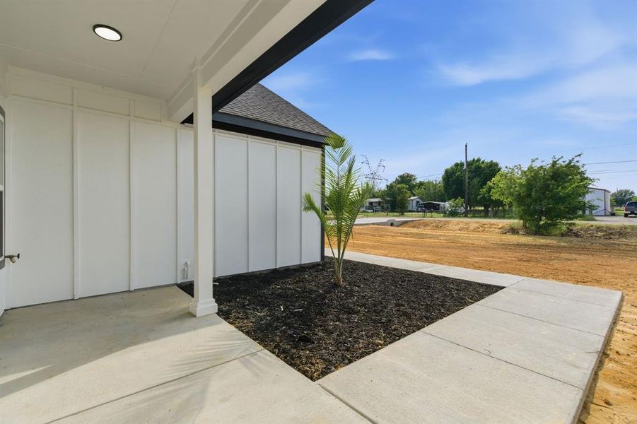 Exterior details and patio area of a home in , Joshua (Image 28).