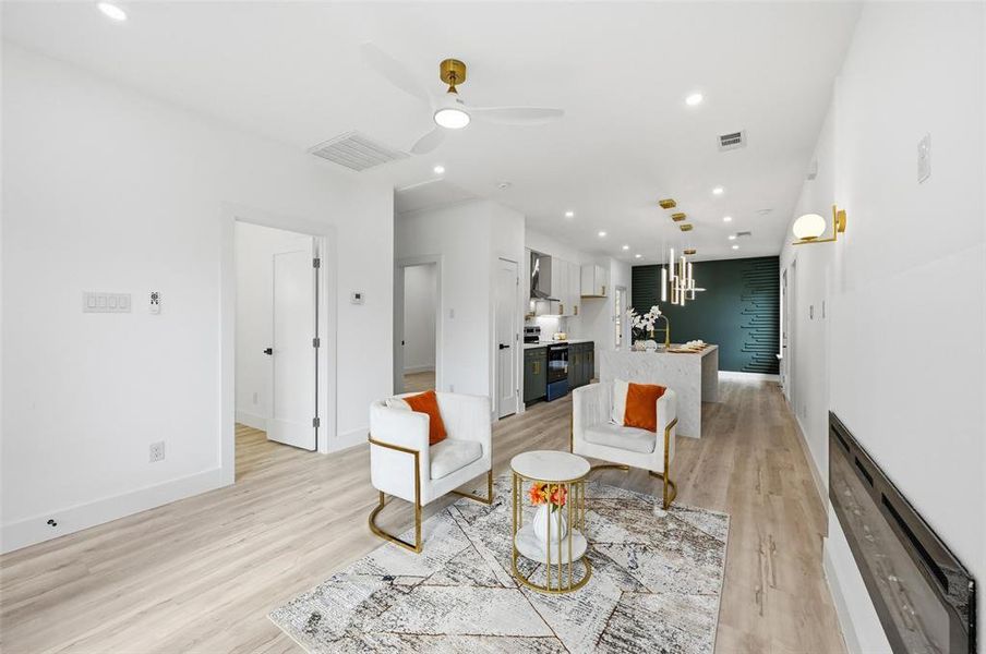 Defined cozy living room open to kitchen Defined cozy living room open to kitchen