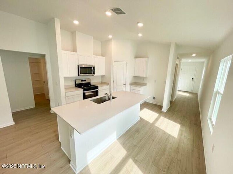 Furnished interior view inside a new home in Grand Reserve, Bunnell (Image 16).