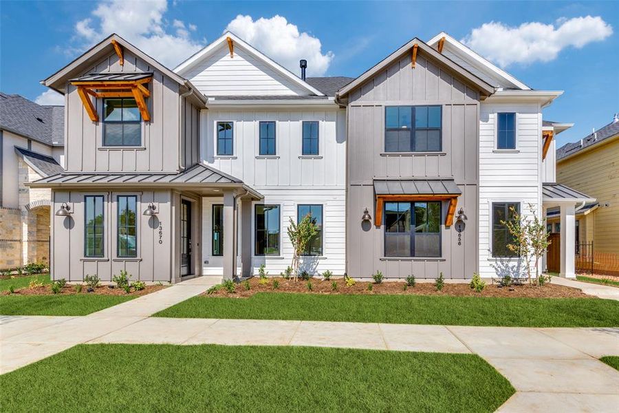 View of front of property with a front yard