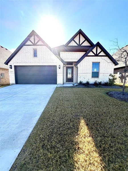Front exterior of a new home in , Royse City, TX, highlighting curb appeal (Image 1).